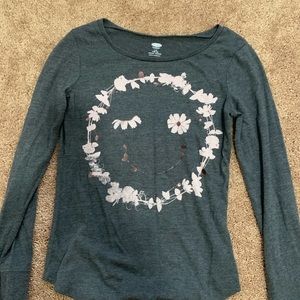 Adorable grey long-sleeve wink face flower emoji